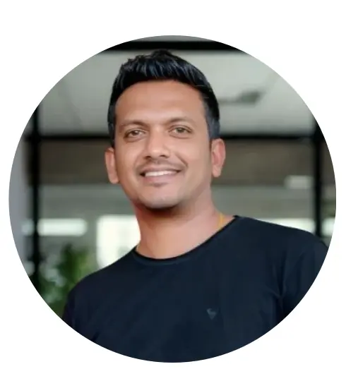 Professional portrait of the CEO in a modern office setting