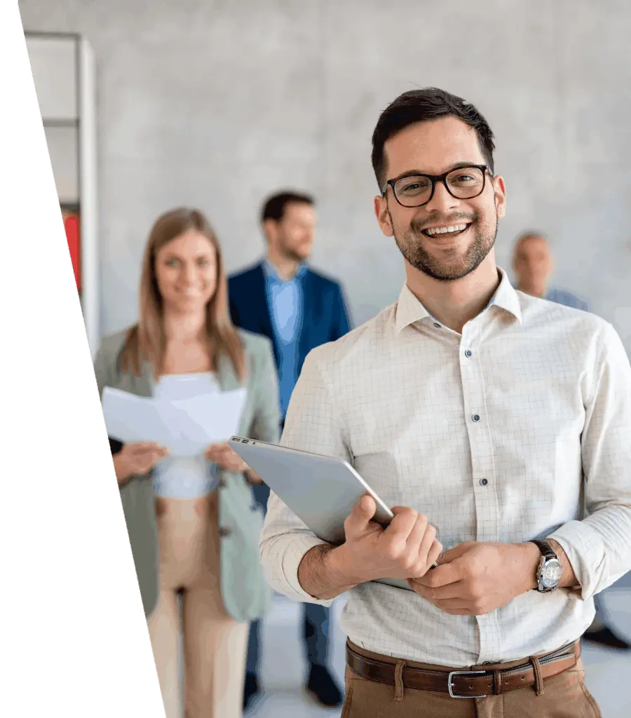 Professional ecommerce consultant holding a tablet with a confident team in the background